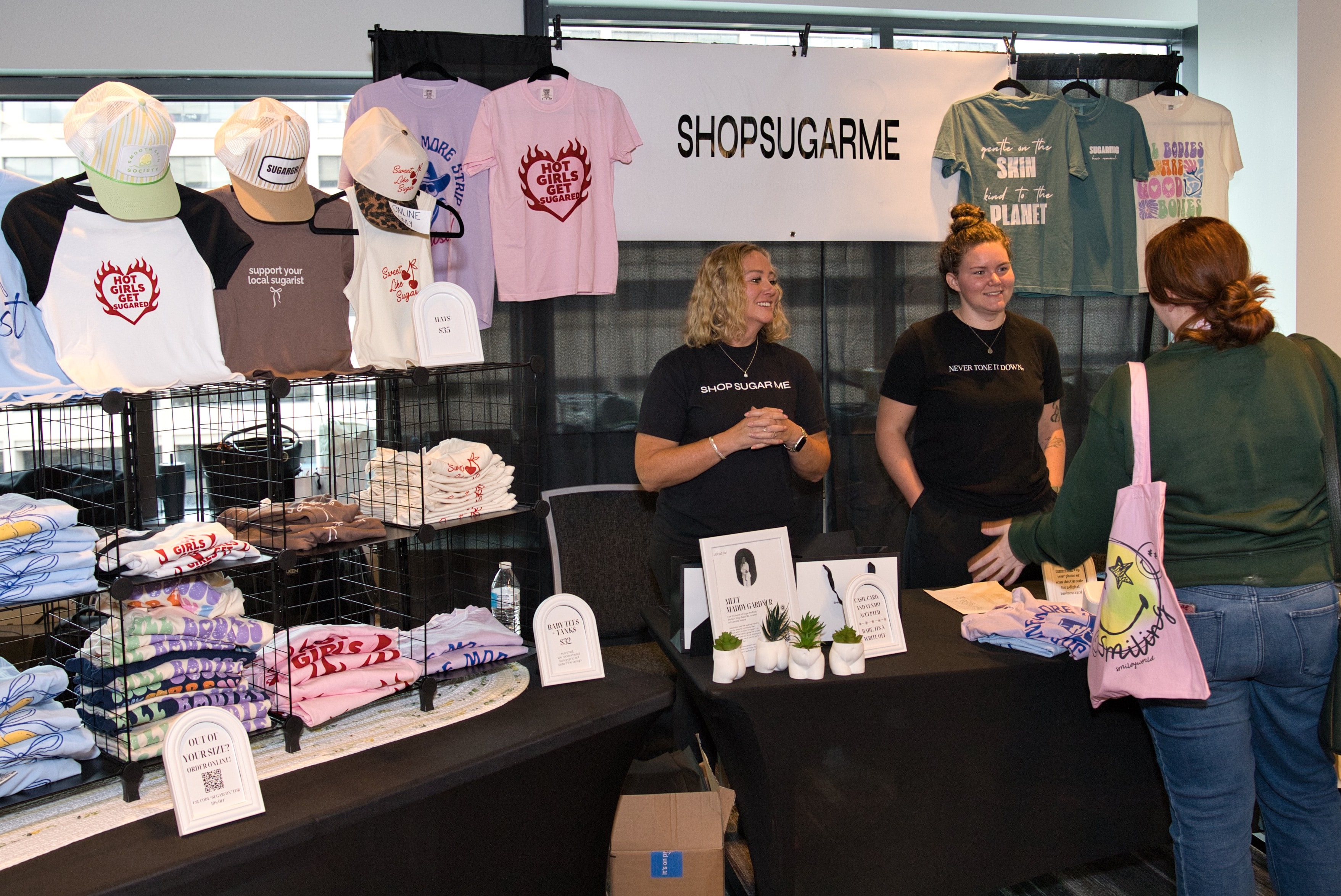 ShopSugarMe merchandise booth at Sugar Con 2026